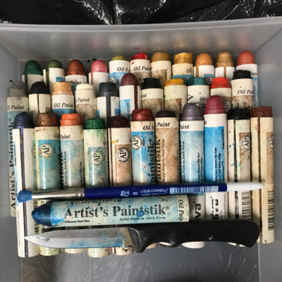2. I'm using Shiva Paintstiks. They come in lots of colors. I'm going to use Iridescent Dark Blue. You can also see the stiff bristle brush I'll be using.