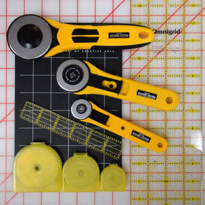 Don't forget extra rotary blades and a mini cutting board.